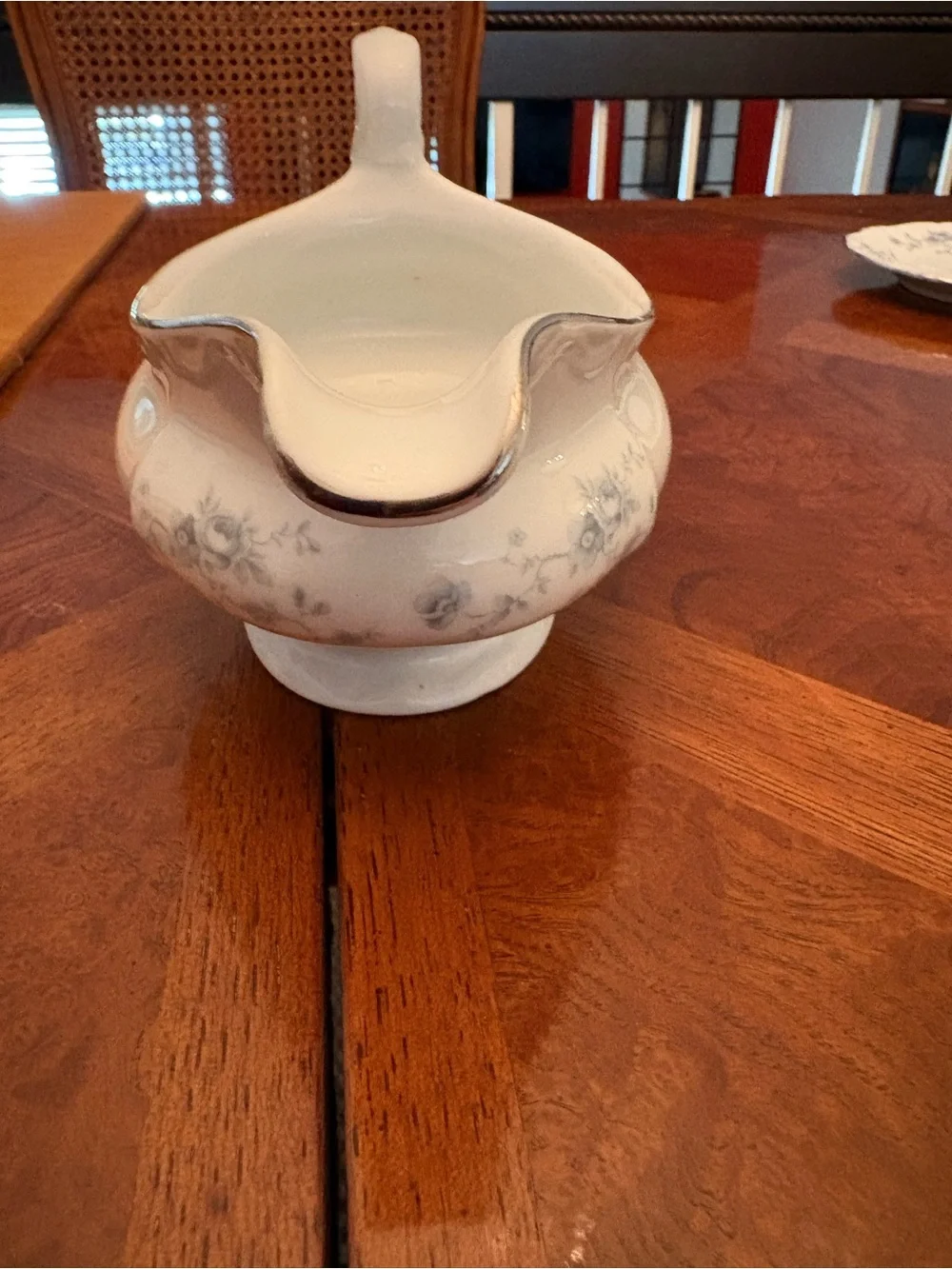 Classic White Porcelain Gravy Boat with Floral Motif